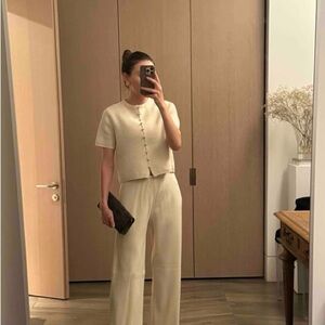 Short sleeve knit button down detail top